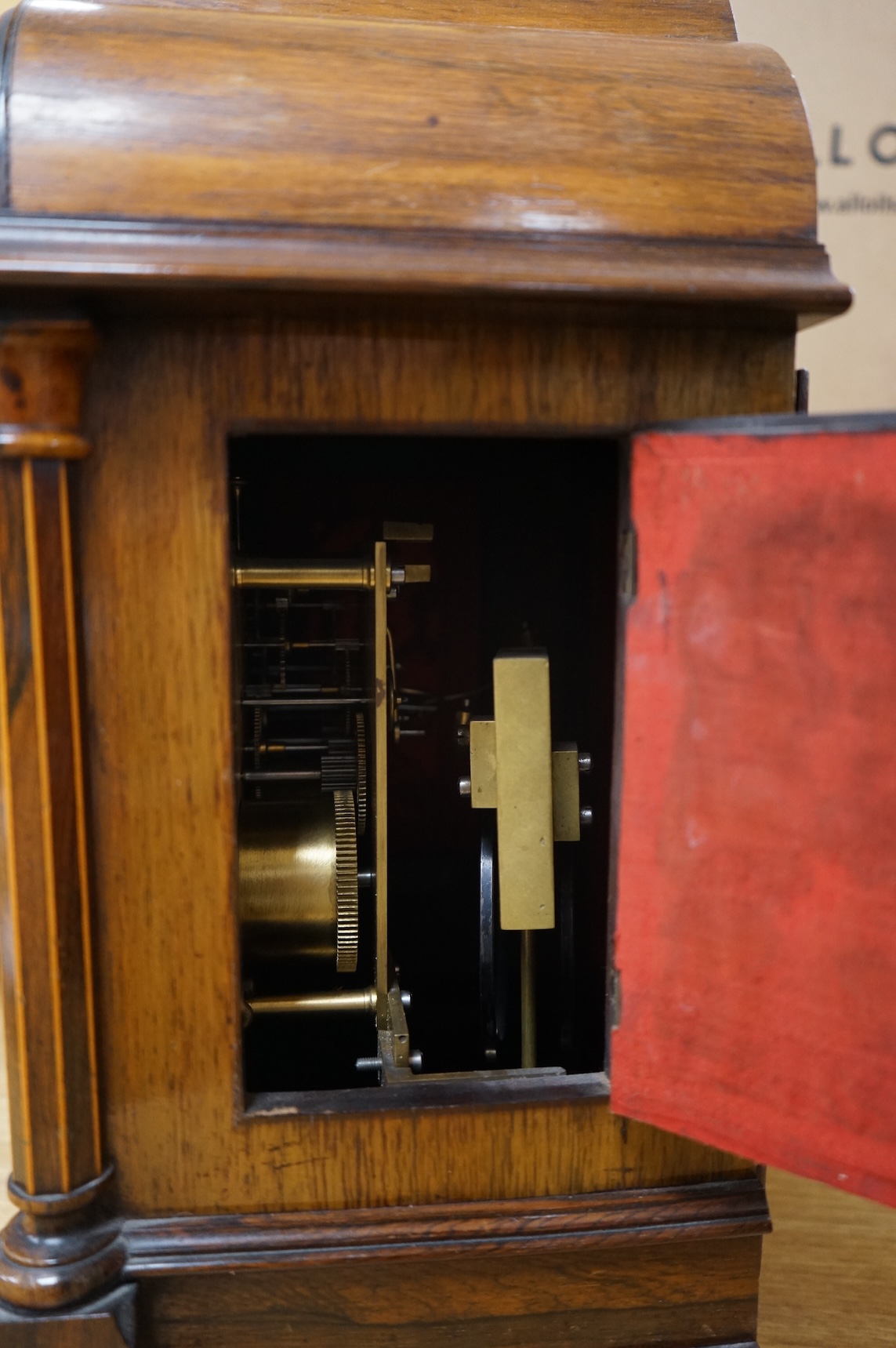 A rosewood mantel clock with French silk suspension movement, together with an Edwardian marquetry bracket clock signed to the dial S.Smith and son, Strand, London with a two train German movement striking on two coiled